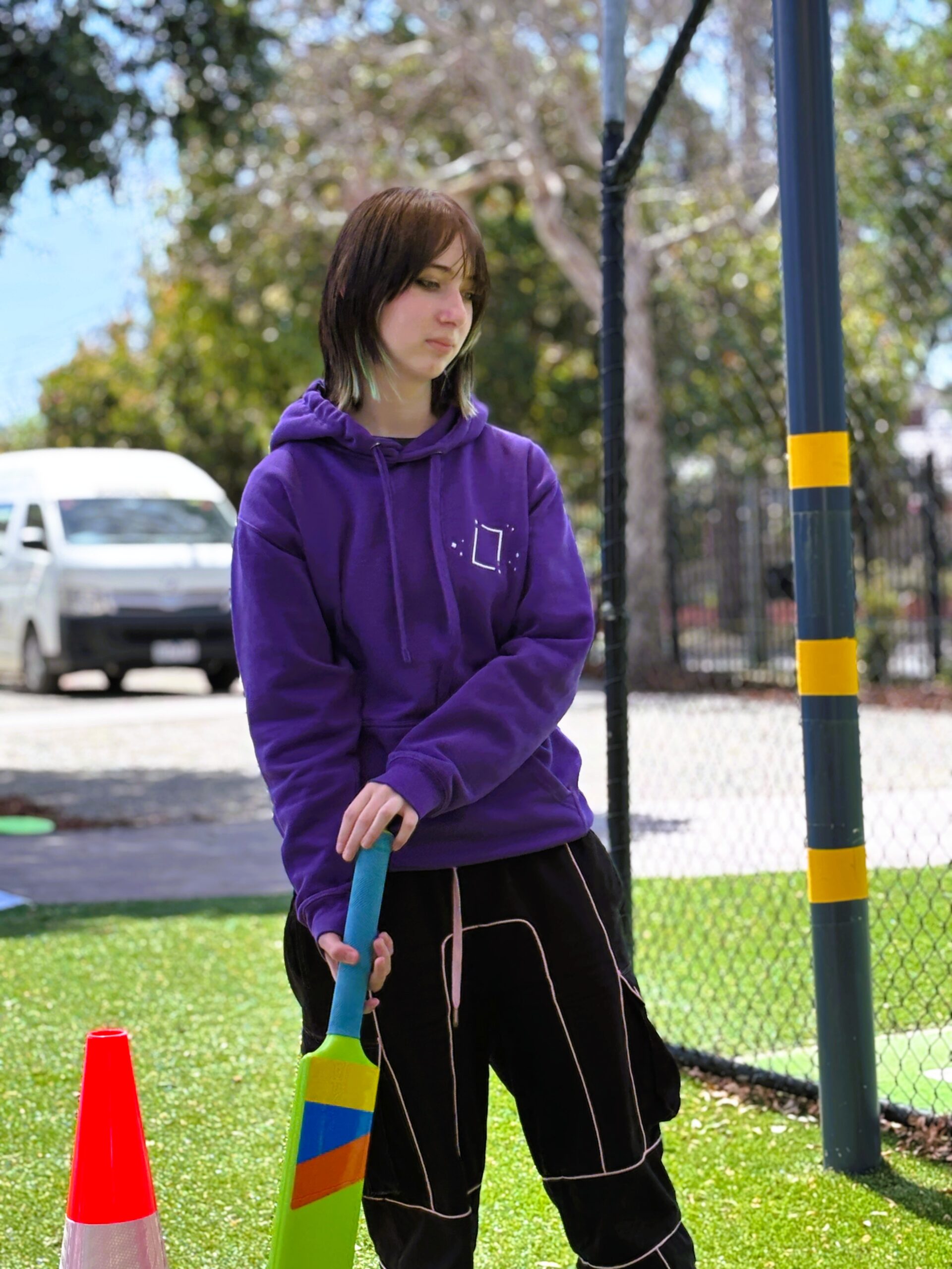 Student with cricket bat